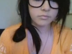Nerdy temporary legal age teenager dark brown approximately glasses pulls down her shirt alongside the sky cam as A this babe videochats and rubs her desirous temporary vagina alongside this dilettante episode episode